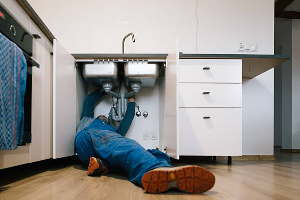 Professional Plumbing technician working in Rabun Gap, GA